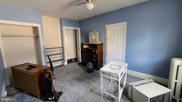 bedroom featuring carpet floors, baseboards, and a closet