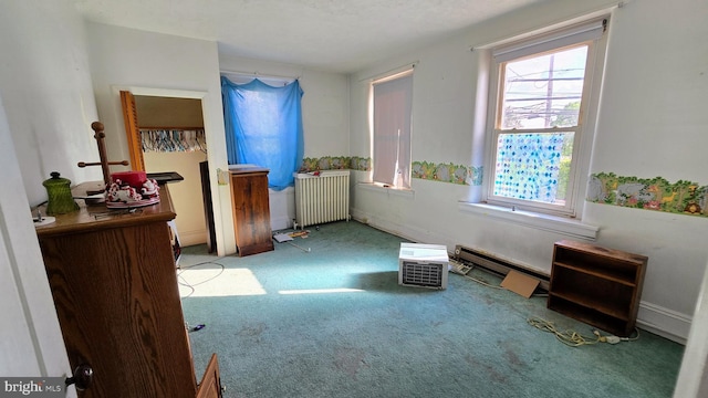 unfurnished bedroom featuring radiator and carpet floors