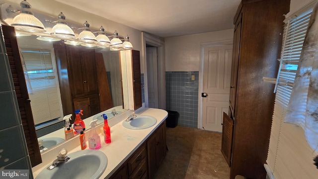 bathroom featuring double vanity