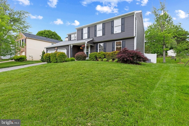 6281 Hidden Clearing, Columbia, MD 21045 - view of front of house featuring a front lawn and a garage
