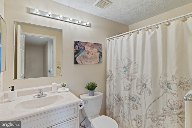 6281 Hidden Clearing, Columbia, MD 21045 - bathroom with vanity, a textured ceiling, toilet, and curtained shower