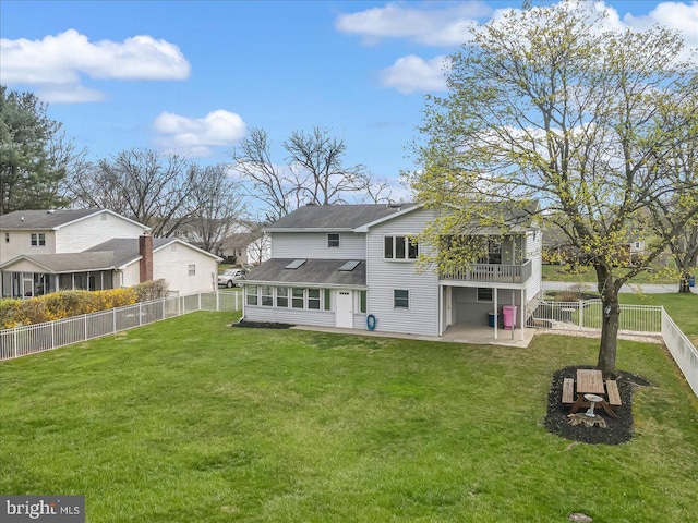 rear view of house with a patio area, a residential view, and roof with shingles