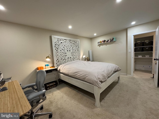 carpeted bedroom featuring recessed lighting, baseboards, and a desk