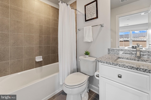 13244 Woodland Pond Pl, Herndon, VA 20171 - full bathroom featuring toilet, vanity, shower / tub combo with curtain, baseboards, and tile patterned floors
