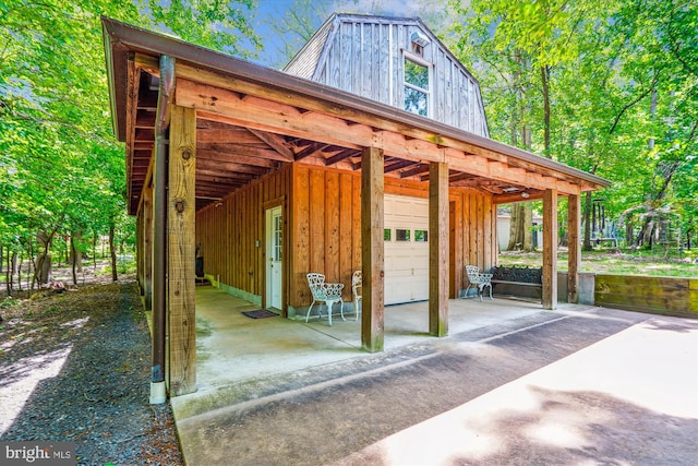 3415 Miller Heights Rd, Oakton, VA 22124 - view of patio / terrace featuring a garage and driveway