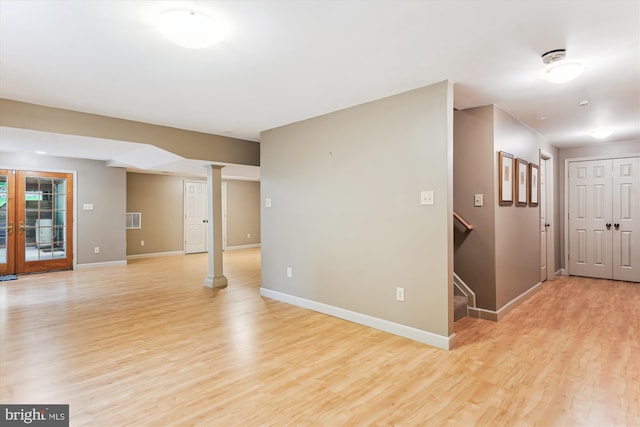 3415 Miller Heights Rd, Oakton, VA 22124 - unfurnished living room with light wood-type flooring and baseboards