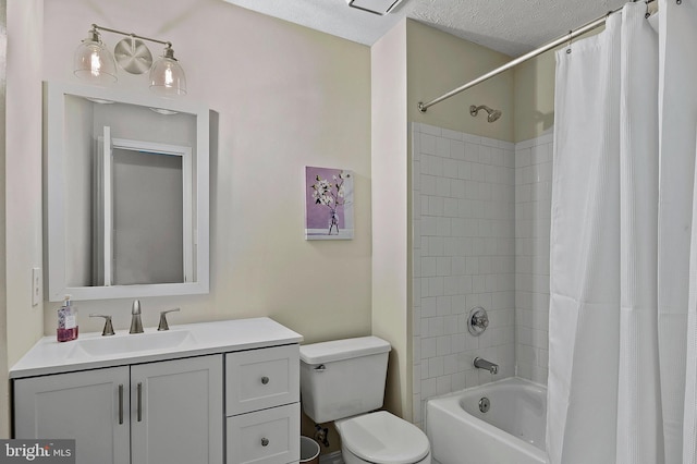 full bath with toilet, shower / bath combination with curtain, vanity, and a textured ceiling