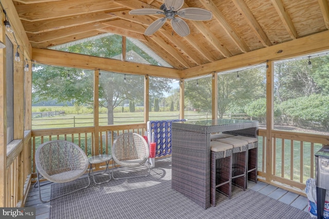 18418 Gravel Hill Rd, Georgetown, DE 19947 - sunroom / solarium featuring ceiling fan, lofted ceiling, and view of wooded area
