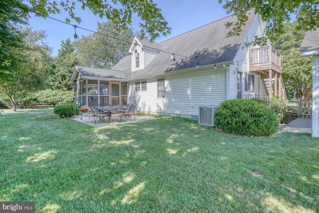 18418 Gravel Hill Rd, Georgetown, DE 19947 - rear view of property featuring cooling unit, a yard, a sunroom, a patio, and a shingled roof