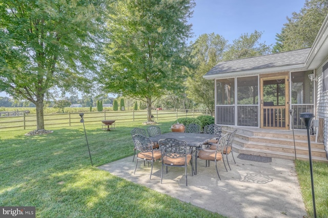 18418 Gravel Hill Rd, Georgetown, DE 19947 - view of patio featuring a sunroom and outdoor dining space