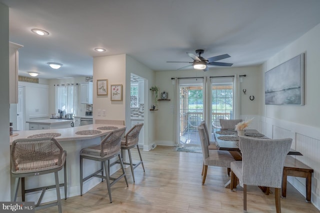 18418 Gravel Hill Rd, Georgetown, DE 19947 - dining space with ceiling fan, light wood finished floors, a wainscoted wall, and recessed lighting