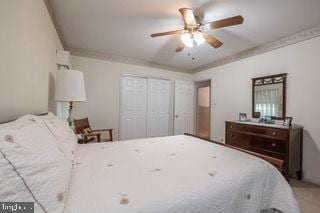 bedroom featuring ceiling fan