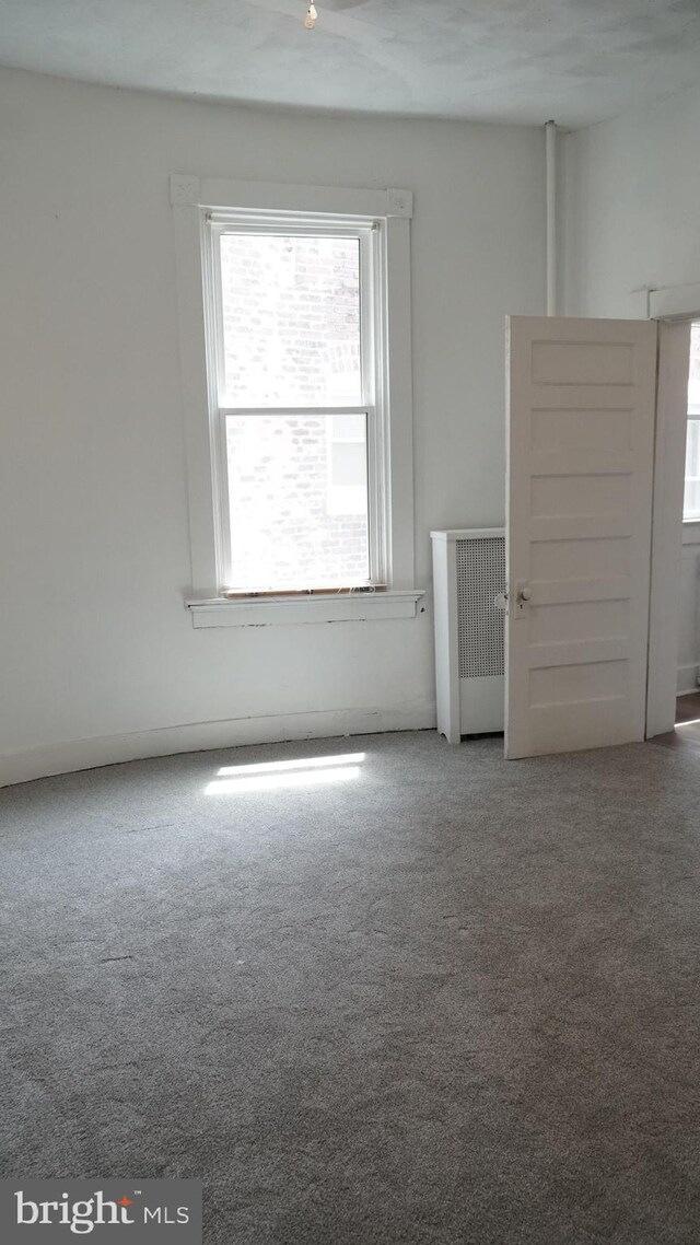 2236 Linden Ave, Baltimore, MD 21217 - empty room featuring carpet floors and healthy amount of natural light