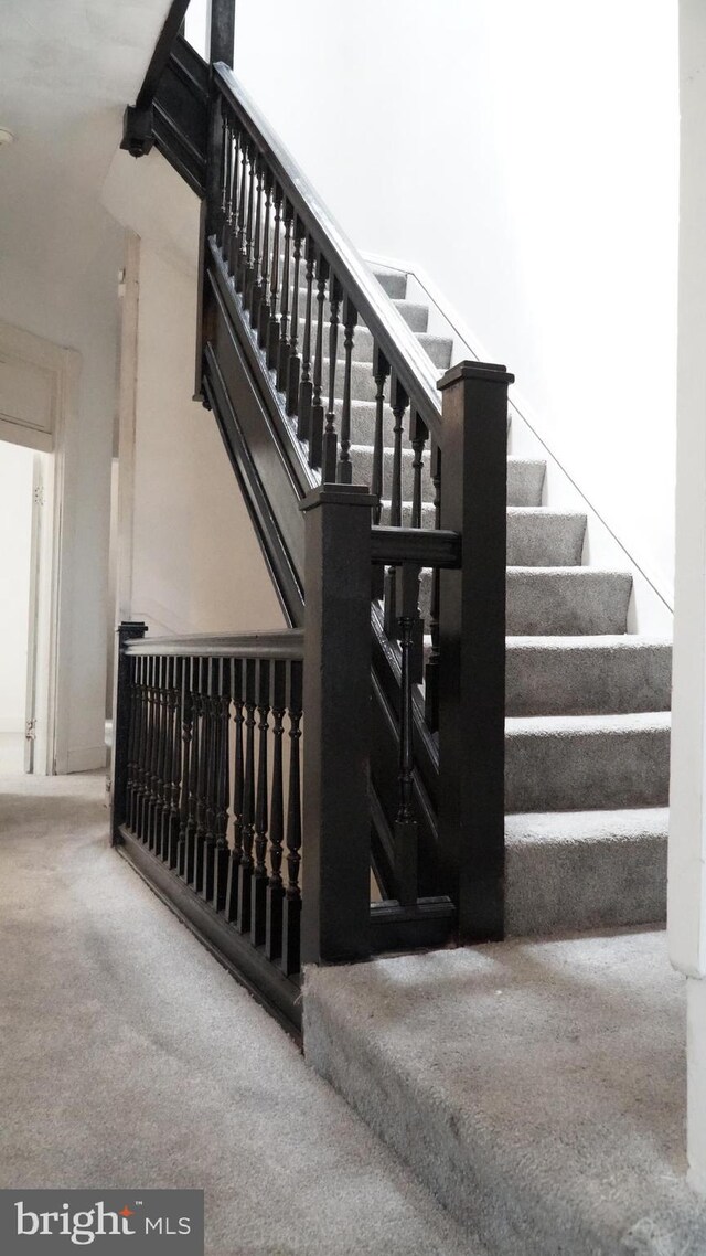 2236 Linden Ave, Baltimore, MD 21217 - staircase featuring carpet flooring