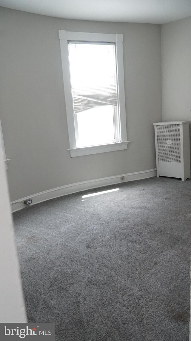 2236 Linden Ave, Baltimore, MD 21217 - empty room with carpet floors and baseboards