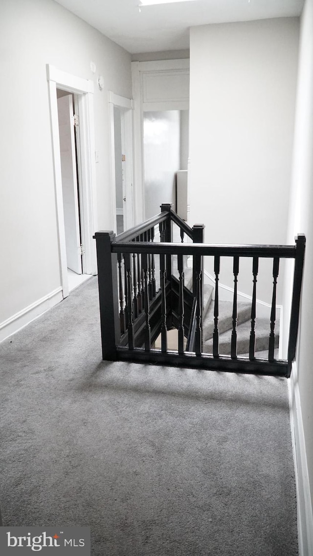 2236 Linden Ave, Baltimore, MD 21217 - staircase featuring carpet and baseboards