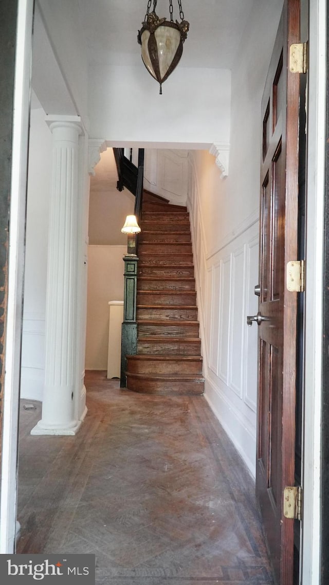 2236 Linden Ave, Baltimore, MD 21217 - foyer entrance featuring decorative columns, arched walkways, stairway, and a decorative wall