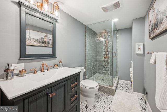 full bath featuring a shower stall, toilet, and vanity