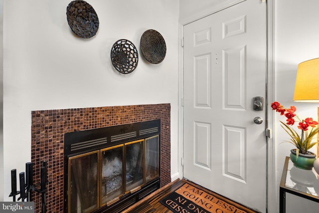 1019 Summerglenn Ct Unit 7-302, Bowie, MD 20721 - detailed view of a tiled fireplace and wood finished floors