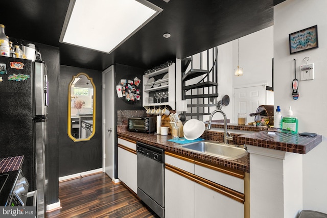 1019 Summerglenn Ct Unit 7-302, Bowie, MD 20721 - kitchen featuring appliances with stainless steel finishes, a sink, dark countertops, dark wood finished floors, and tasteful backsplash