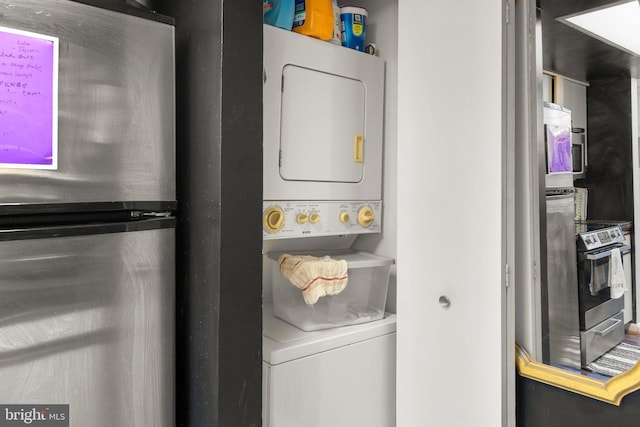1019 Summerglenn Ct Unit 7-302, Bowie, MD 20721 - washroom with stacked washing machine and dryer