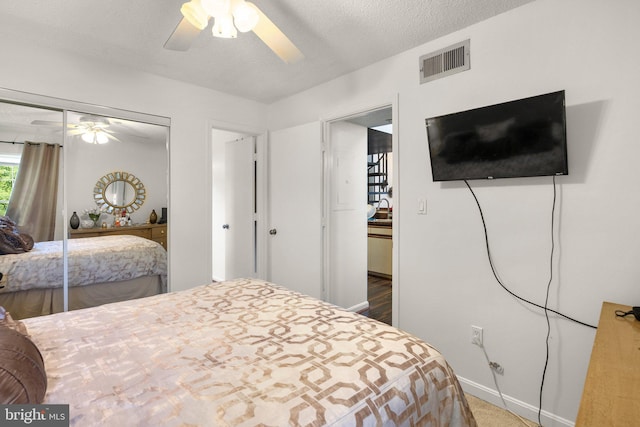 1019 Summerglenn Ct Unit 7-302, Bowie, MD 20721 - bedroom with a closet, baseboards, and a ceiling fan