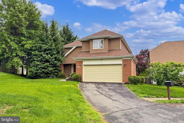 4501 Highland Green Ct, Alexandria, VA 22312 - view of front of home featuring asphalt driveway, an attached garage, a front lawn, central AC unit, and a shingled roof