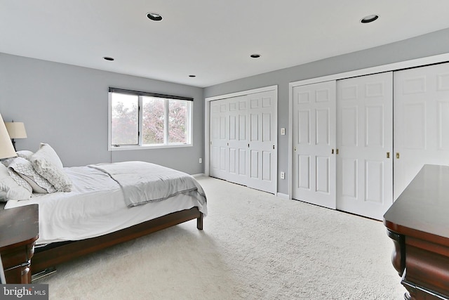 4501 Highland Green Ct, Alexandria, VA 22312 - bedroom with multiple closets, recessed lighting, carpet flooring, and baseboards
