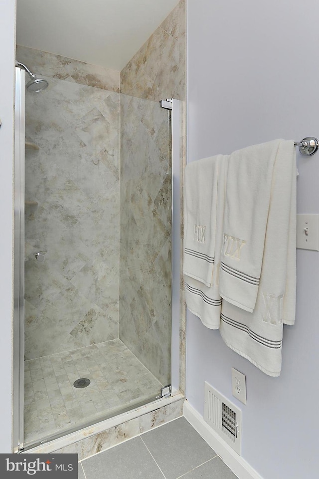 4501 Highland Green Ct, Alexandria, VA 22312 - full bath featuring a stall shower, baseboards, and tile patterned flooring