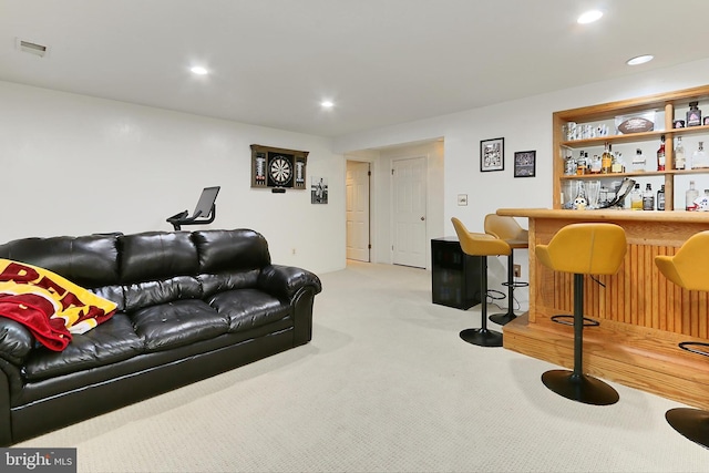 4501 Highland Green Ct, Alexandria, VA 22312 - living room featuring a bar, light colored carpet, and recessed lighting