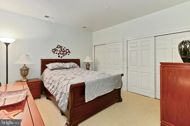 4501 Highland Green Ct, Alexandria, VA 22312 - bedroom with light colored carpet and multiple closets