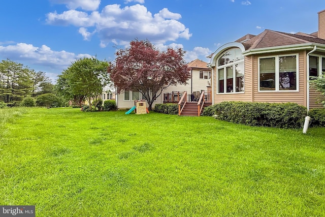4501 Highland Green Ct, Alexandria, VA 22312 - back of property with a deck, a lawn, and a chimney