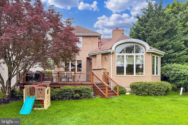 4501 Highland Green Ct, Alexandria, VA 22312 - rear view of property featuring a yard, a chimney, a wooden deck, and roof with shingles