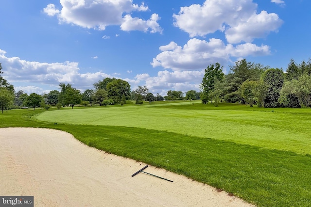4501 Highland Green Ct, Alexandria, VA 22312 - surrounding community with golf course view, a lawn, and view of wooded area