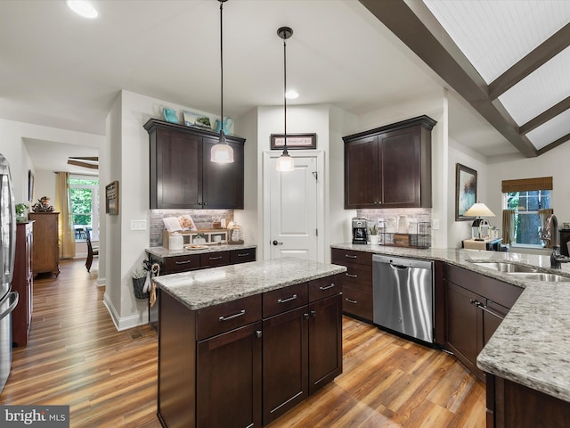 20 Parker Dr, Millsboro, DE 19966 - kitchen featuring stainless steel dishwasher, a sink, wood finished floors, backsplash, and recessed lighting