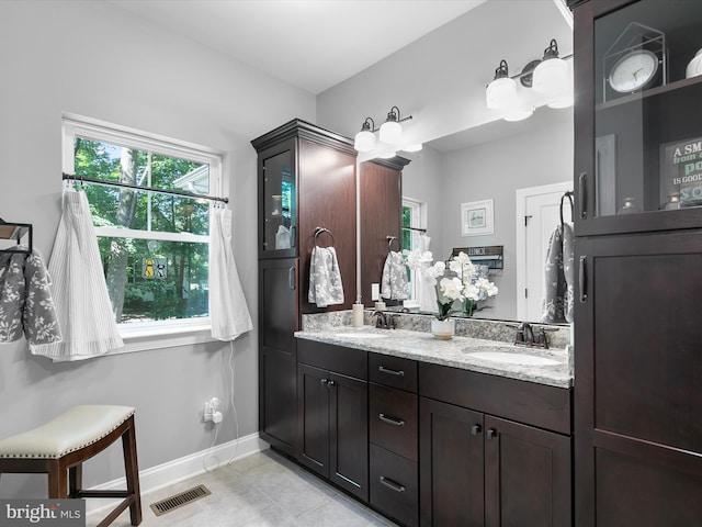 20 Parker Dr, Millsboro, DE 19966 - full bathroom featuring double vanity, tile patterned flooring, and baseboards