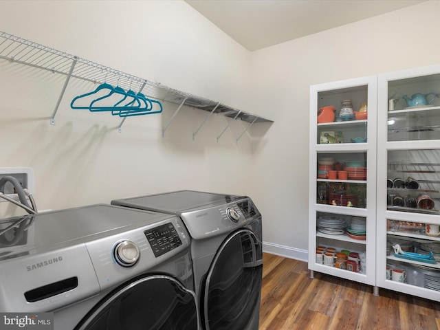20 Parker Dr, Millsboro, DE 19966 - washroom with washer and clothes dryer, wood finished floors, and baseboards