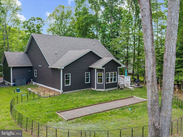 20 Parker Dr, Millsboro, DE 19966 - rear view of property with a shingled roof