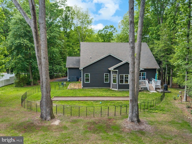 20 Parker Dr, Millsboro, DE 19966 - back of property featuring a wooden deck and a shingled roof