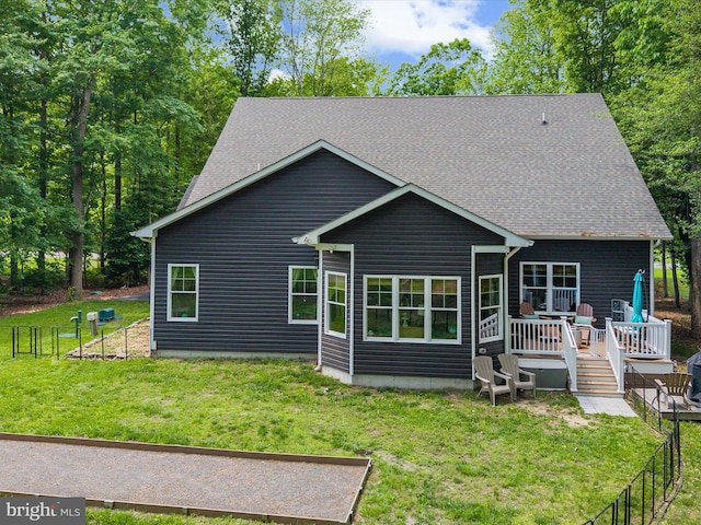 20 Parker Dr, Millsboro, DE 19966 - rear view of house featuring a deck and a shingled roof