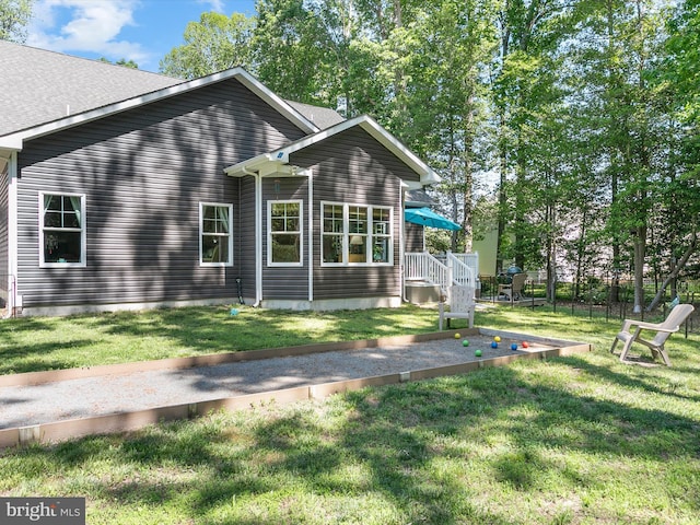 20 Parker Dr, Millsboro, DE 19966 - rear view of house featuring a yard
