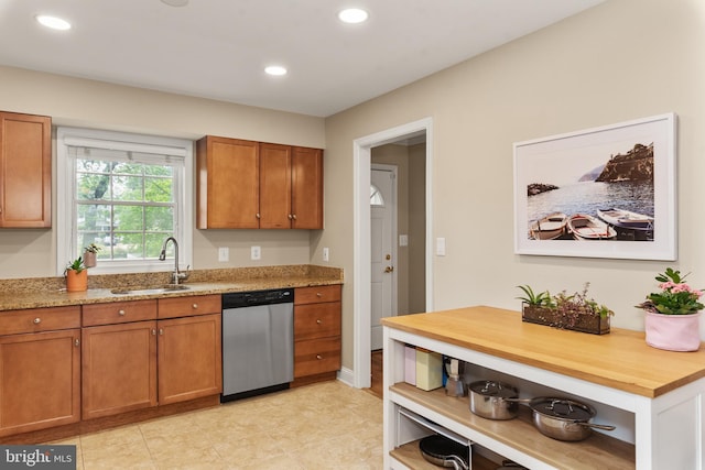 23 Linden Ave, Annapolis, MD 21401 - kitchen with stainless steel dishwasher, a sink, brown cabinetry, recessed lighting, and butcher block countertops