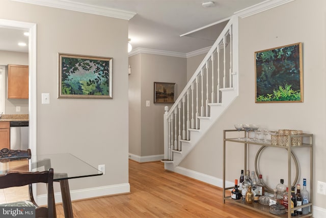 23 Linden Ave, Annapolis, MD 21401 - entryway featuring light wood finished floors, stairway, baseboards, and ornamental molding