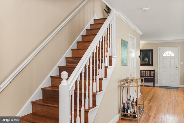 23 Linden Ave, Annapolis, MD 21401 - staircase with crown molding, hardwood / wood-style flooring, and baseboards