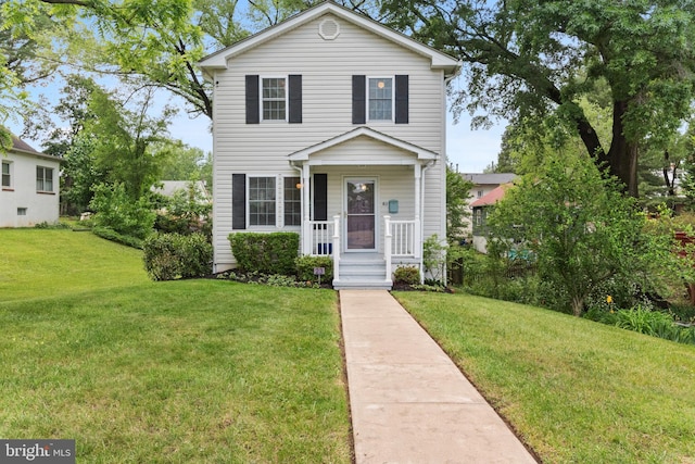 23 Linden Ave, Annapolis, MD 21401 - traditional-style house with a front lawn and a porch