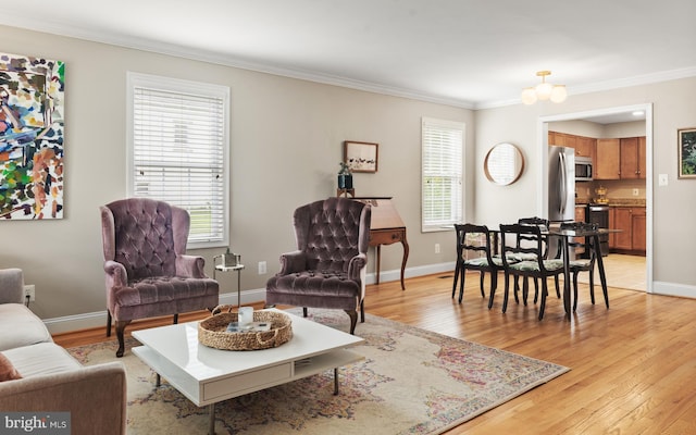 23 Linden Ave, Annapolis, MD 21401 - living area featuring crown molding, light wood-style flooring, and baseboards