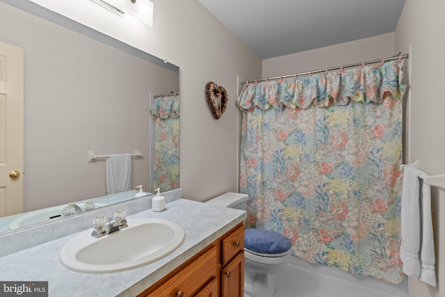 407 Stanford Rd, Fairless Hills, PA 19030 - bathroom featuring vanity, toilet, curtained shower, and tile patterned flooring