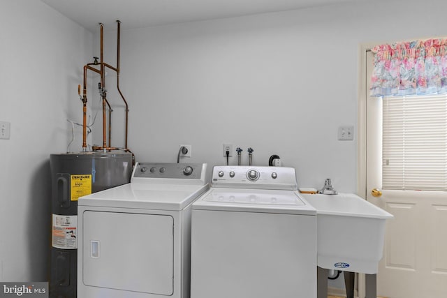 407 Stanford Rd, Fairless Hills, PA 19030 - washroom featuring electric water heater and washer and clothes dryer