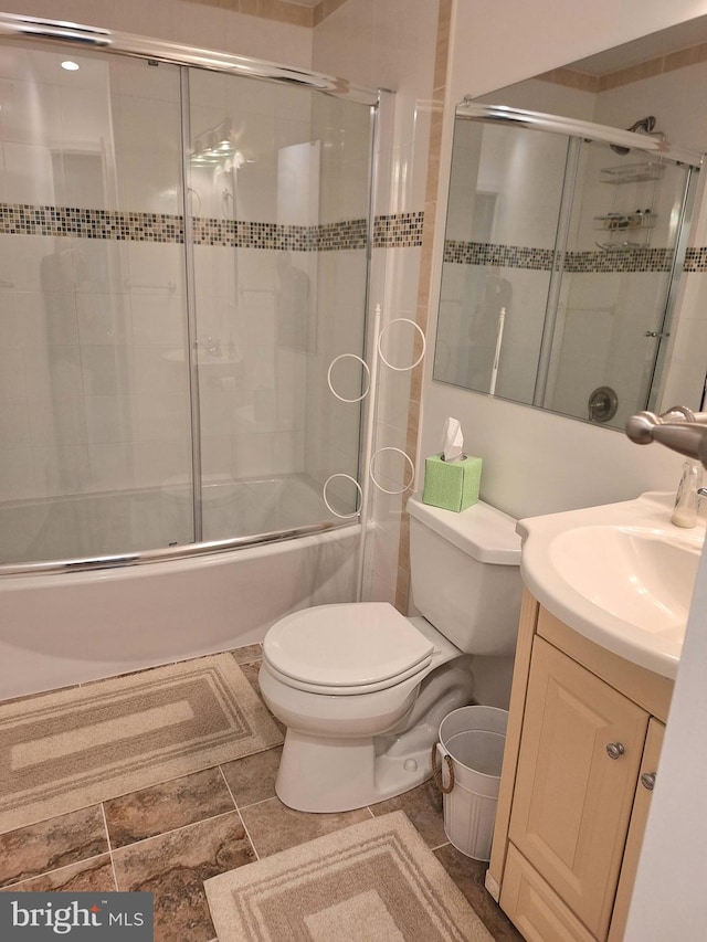 839 Shore Dr, Edgewater, MD 21037 - full bathroom featuring toilet, enclosed tub / shower combo, and vanity