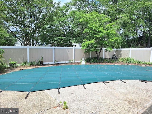 839 Shore Dr, Edgewater, MD 21037 - view of swimming pool featuring a fenced backyard and a patio area